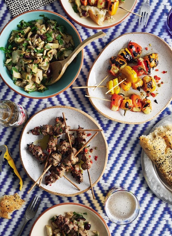 Lamb and lemon leaf skewers with eggplant and artichoke salad