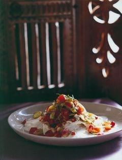 Lamb and pistachio manti with pomegranate salad and garlic yoghurt sauce