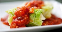 Lamb and rice stuffed cabbage with tomato sauce