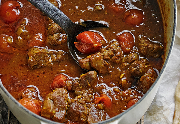 Lamb and tomato curry with mint yogurt