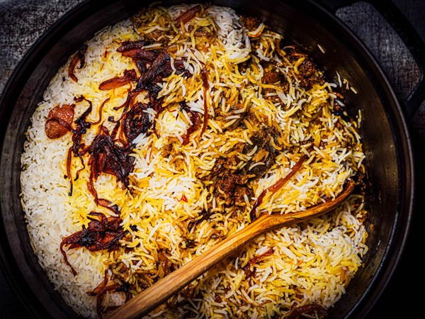 Lamb biryani with saffron, yogurt, and caramelized onions