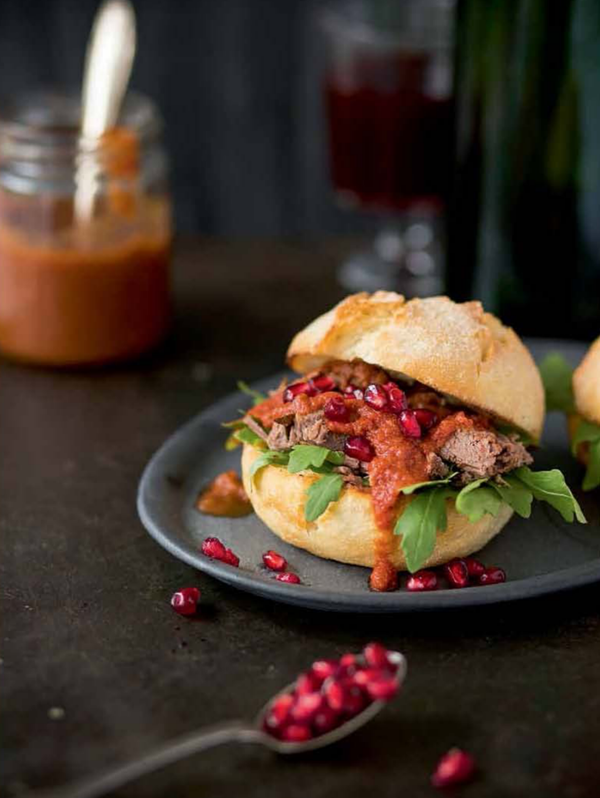 Lamb burger with pomegranate seeds