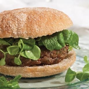 Lamb burgers topped with mâche salad