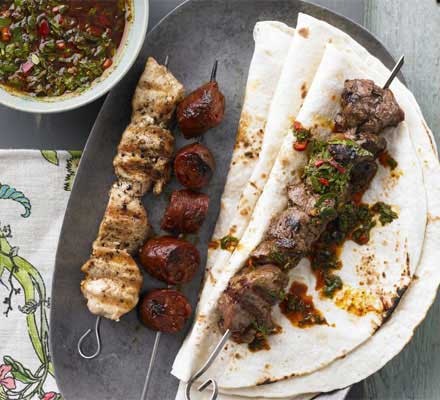 Lamb, chicken and chorizo skewers with chimichurri