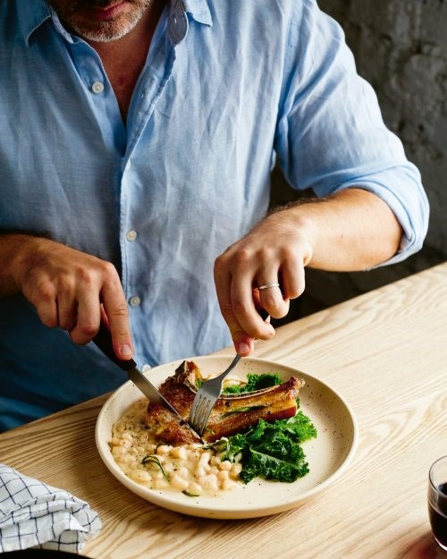 Lamb chops with cacio e pepe white beans