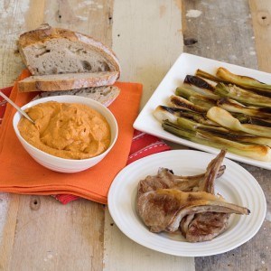 Lamb cutlets, romesco sauce & spring onions