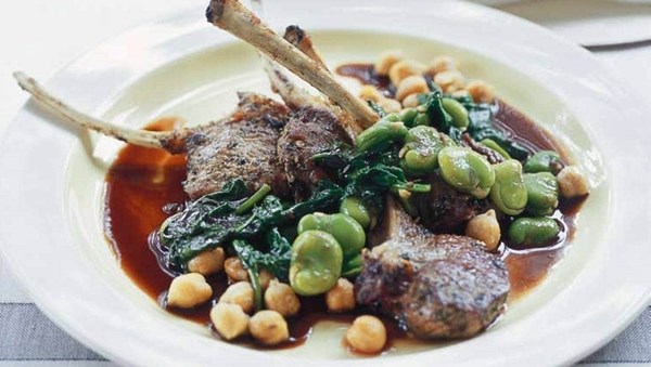 Lamb cutlets with anchovy gravy, fried chickpeas, broad beans and spinach