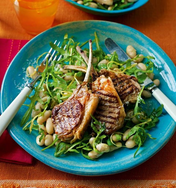 Lamb cutlets with cannellini beans, rocket and Parmesan dressing
