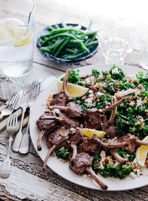 Lamb cutlets with seared kale, quinoa, almonds and feta salad