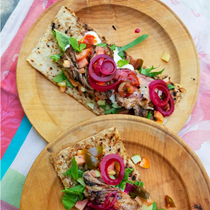 Lamb flatbreads with tomatoes, pickled onions and mint yoghurt
