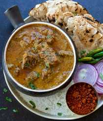 Lamb in onion-coconut curry (Lamb kala masala)