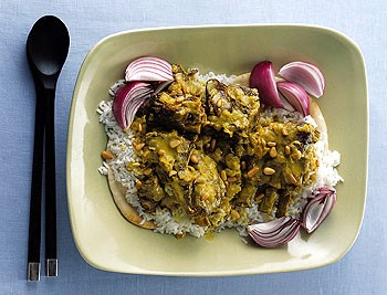 Lamb in spiced yogurt sauce with rice and bread (Mensaf)