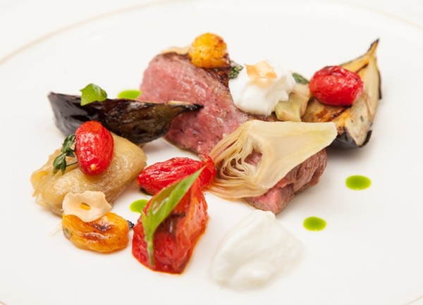 Lamb leg with sheep curd, aubergine caviar, artichoke and roasted tomatoes
