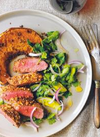 Lamb loin dusted with dukkah with parsley and red onion salad