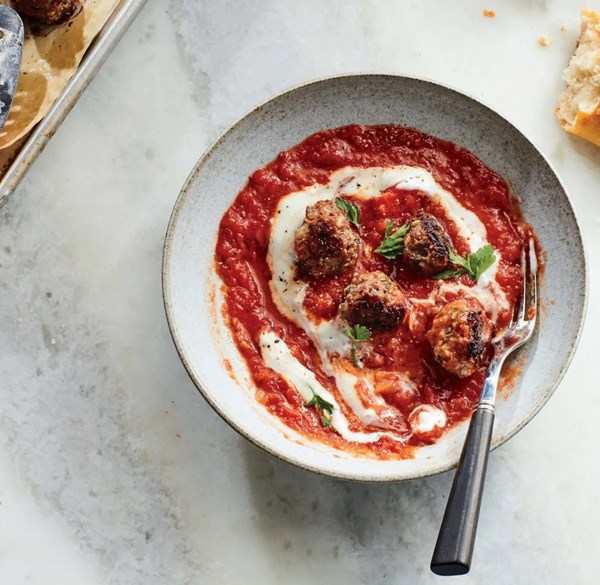 Lamb meatballs with harissa, tomato sauce, and yogurt 