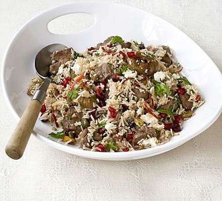 Lamb pilaf with figs, pomegranate and feta