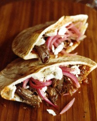 Lamb pita pockets with tomato-ginger compote