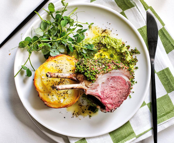 Lamb rib roast with pommes Anna and pea purée