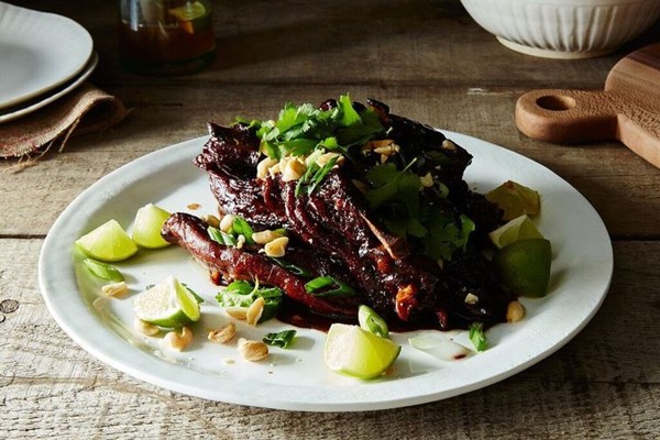 Lamb ribs with tamarind, honey, and toasted peanuts