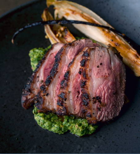 Lamb rump with vanilla-braised chicory and sorrel pesto