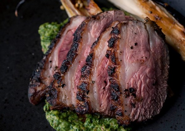 Lamb rump with vanilla-braised chicory and sorrel pesto