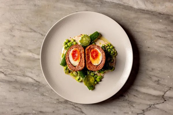 Lamb Scotch egg, broad beans, pea and pickled cucumber salad, tahini yoghurt