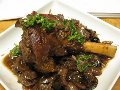 Lamb shanks with melted grapes and grape gremolata