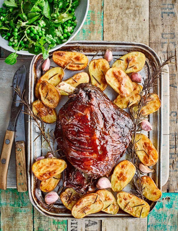 Lamb shoulder with garlic potatoes and redcurrant glaze