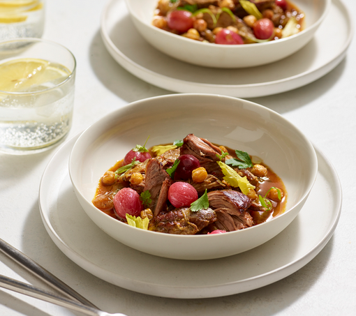 Lamb shoulder with harira, slow roasted grapes and crispy chickpeas