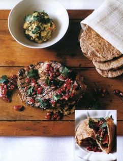 Lamb steaks with pomegranate, avocado and Arabic bread