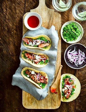 Lamb tacos with minted pea guacamole