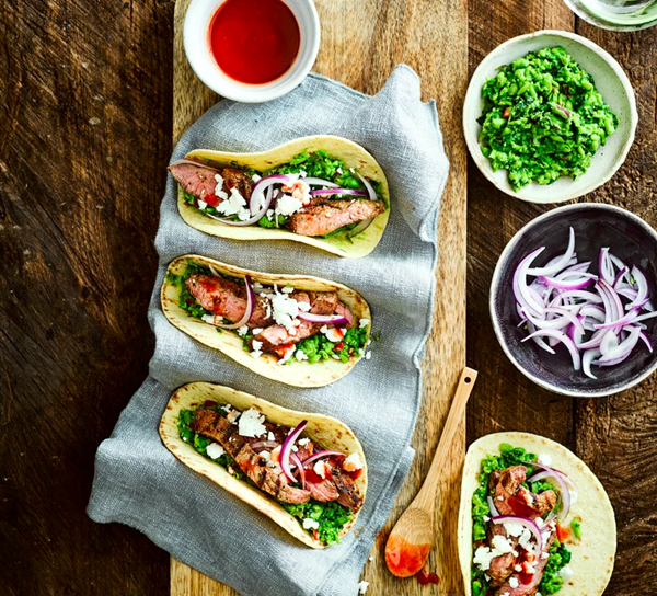 Lamb tacos with minted pea guacamole 