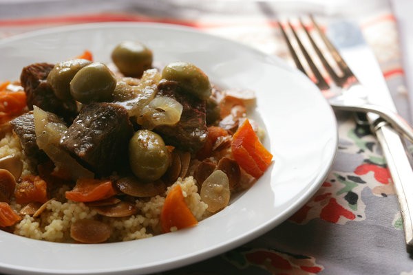 Lamb tagine with apricots, olives and buttered almonds