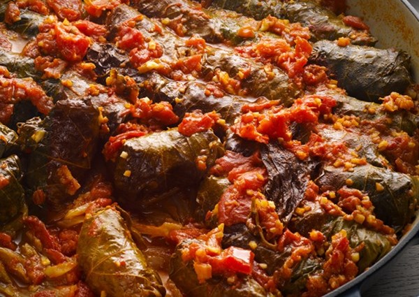 Lamb, tomato and sweet spices stuffed vine leaves