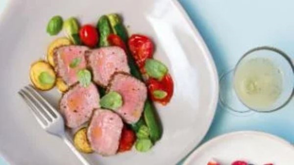 Lamb with fried potatoes, zucchini and tomatoes