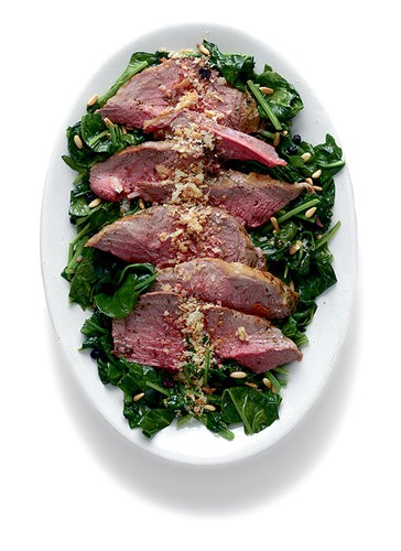 Lamb with herb paste and spinach