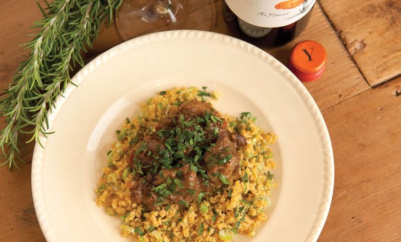 Lamb with raisins, bitter sweet oranges, corn cous cous, fresh herbs and pan juices