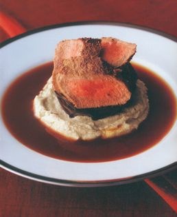 Lamb with roasted cumin crust, smoked eggplant pureé and spicy masala sauce