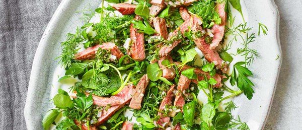 Lamb with soft herb salad and mint sauce dressing