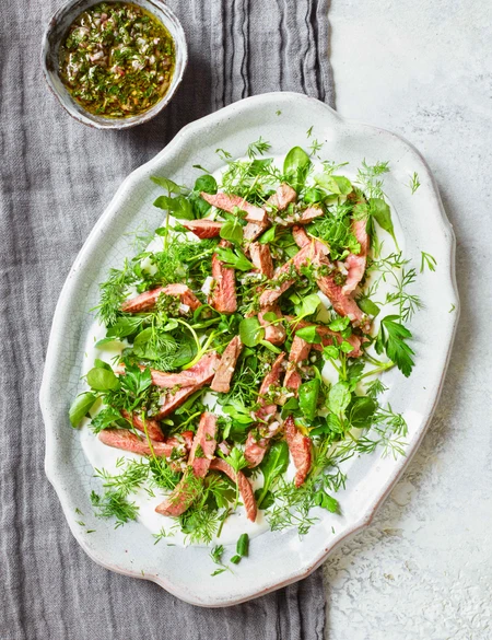 Lamb with soft herb salad and mint sauce dressing