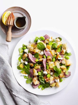 Lamb with torn bread, broad bean and mint salad