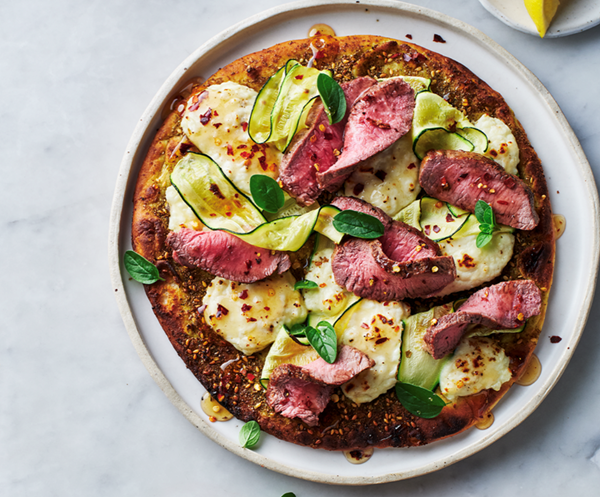 Lamb, zucchini and haloumi flatbreads with chilli honey