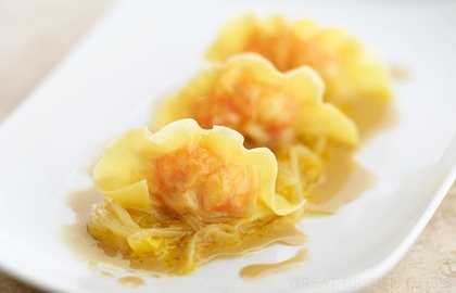 Langoustine ravioli, braised orange endive and langoustine jus