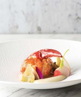Lardo-poached Maine lobster with fennel puree, caramelized fennel, and sauce Américaine "au poivre vert"