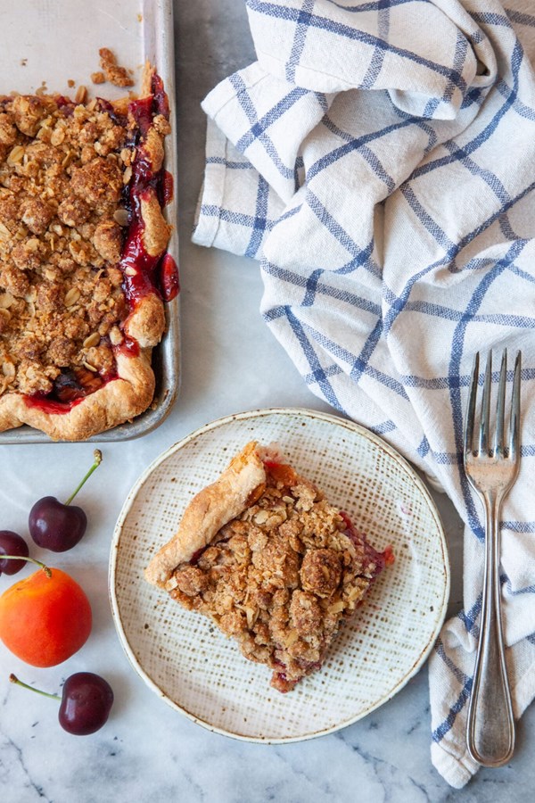 Large batch apricot and cherry slab pie with oat crumb topping