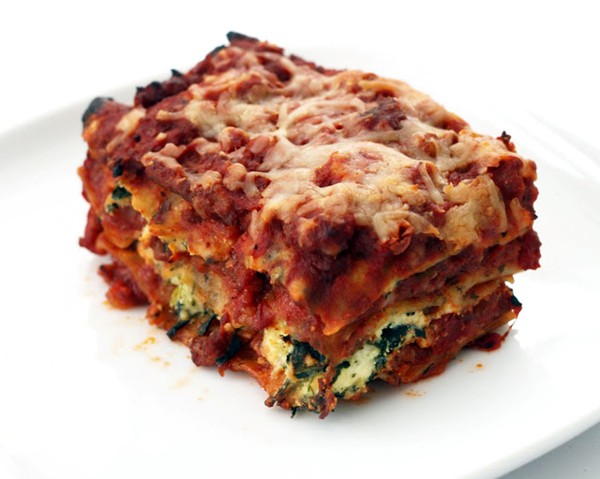 Lasagna with homemade basil noodles and sausage-tomato sauce