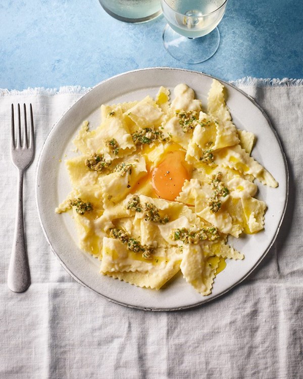 Lasagne sheets with celeriac sauce, olive tapenade, and egg yolk 