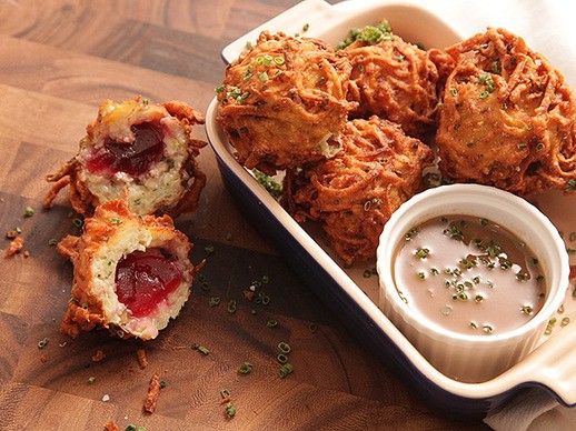 Latke-crusted turkey stuffing fritters with liquid cranberry core and schmaltz gravy