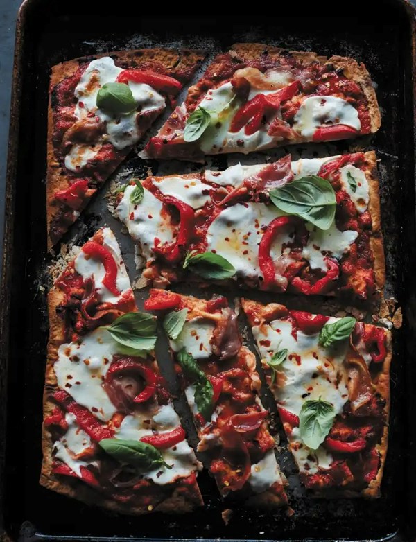 Lavash pizzas with prosciutto, roasted red peppers, and honey