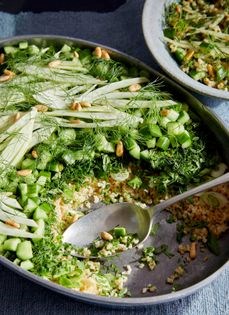 Layered bulgur, fennel, and mint salad with pine nuts